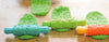rollers on table with dough