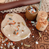 stamps shown with dough and rocks