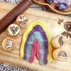 stamps in rainbow dough