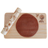 rolling pin shown with board and dough