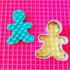 gingerbread shapes shown with playdough and pink mat