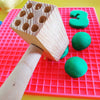 hammer shown flattening playdough