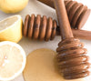 2 dippers shown with honey and lemon