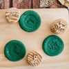 Christmas stamps on a board with playdough