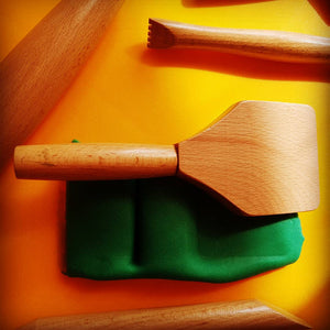 tool shown on green playdough
