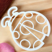 white ladybug-shaped cutter