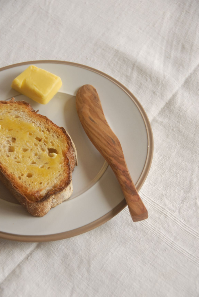 knife shown with toast and butter