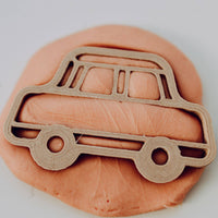 car cutter with orange dough
