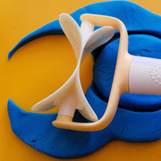 Tool shown cutting out playdough