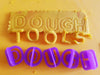 dough tools shown stamped and cut into dough