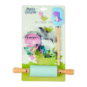 green rolling pin shown with spatula and cutters