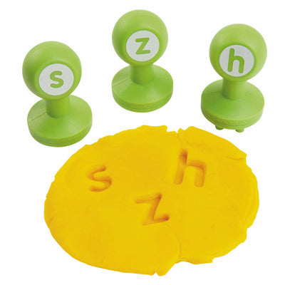 s, z and h stampers with yellow dough
