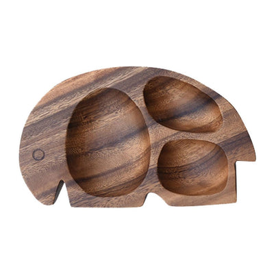 wooden serving plate shaped like an elephant