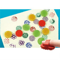Paint designs with finger stampers