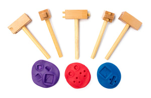 5 wooden hammers shown with imprints in playdough