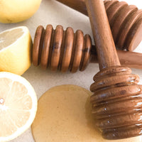 2 dippers shown with honey and lemon