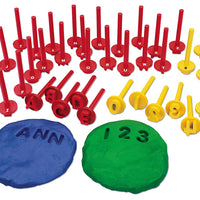 playdough shown with letter stampers