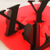 Letters X Y and Z stampers shown in red playdough