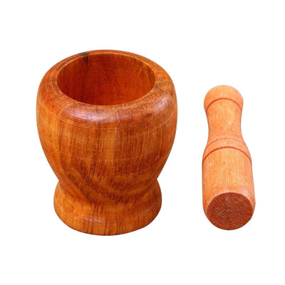 wooden mortar bowl with pestle