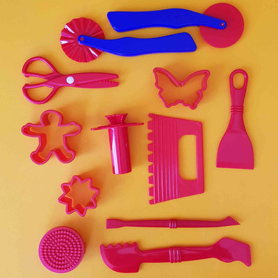collection of red playdough tools