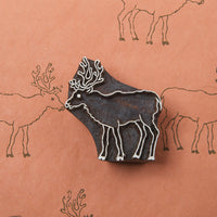 Reindeer design on a Rosewood stamp
