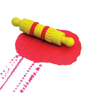 yellow and red pattern roller shown with red playdough