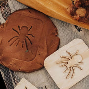 spider stamp with brown dough