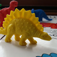 yellow plastic Stegosaurus