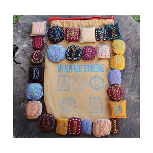 Aplhabet pebbles with "My Alphabet Stone Bag".