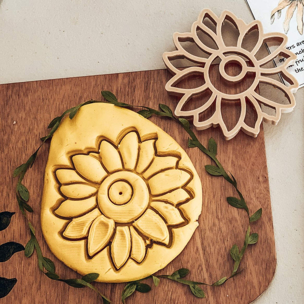 sunflower cutter shown with dough