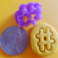 hashtag playdough cutter shown with 50 cent coin