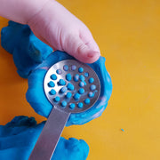tongs shown with playdough