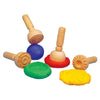 Set of 4 wooden stampers shown with dough