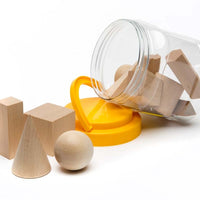 Set of 12 wooden 3D shapes shown with jar